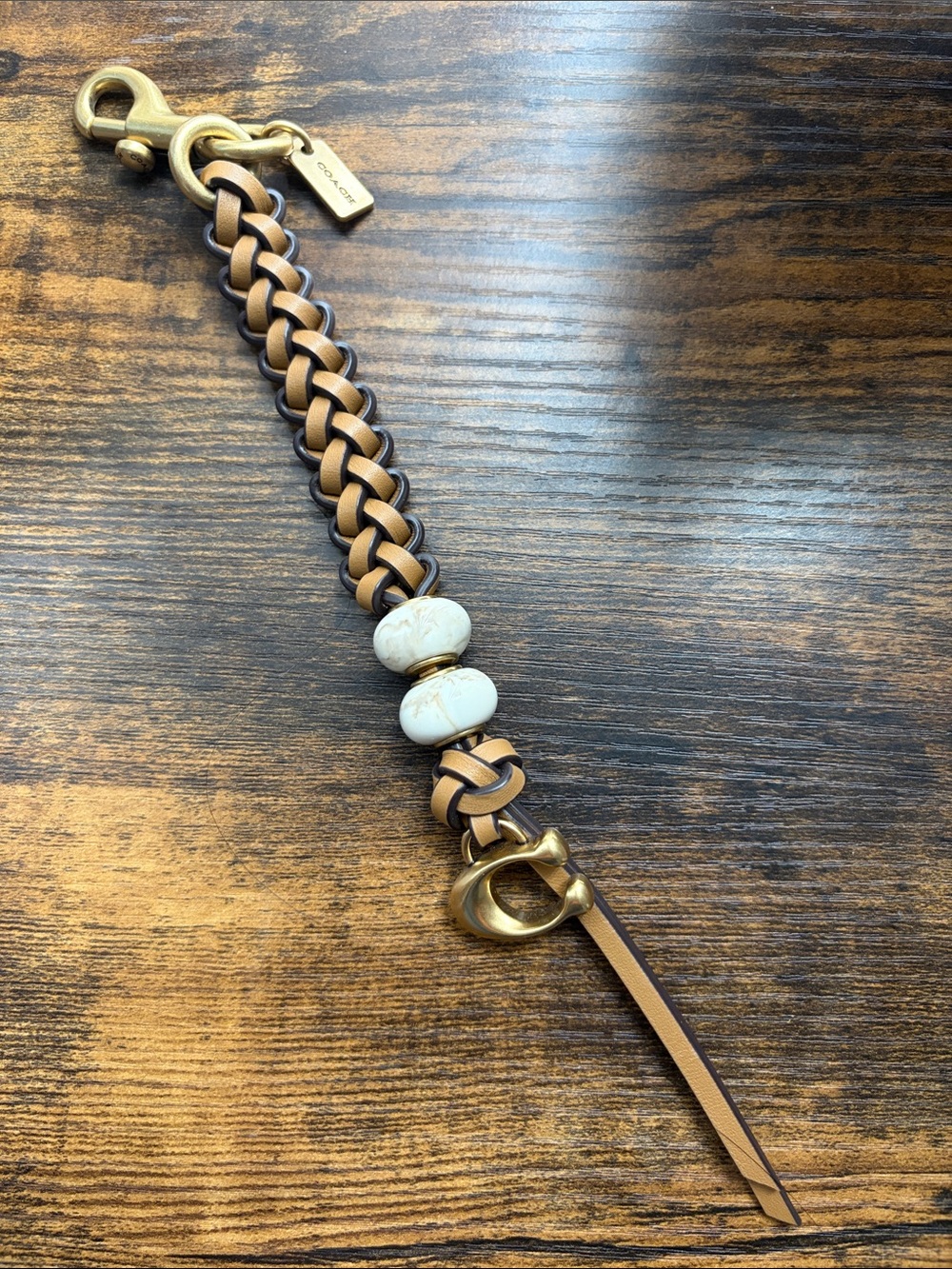 Coach Tan Braided Leather bag charm with Ivory Bead Accents